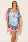 Molly is wearing a 14 suit and L coverup, she has a 36DD bust and a 33" waist.