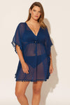 Molly is wearing a 14 suit and L coverup, she has a 36DD bust and a 33" waist.
