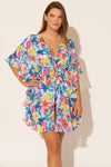 Molly is wearing a 14 suit and L coverup, she has a 36DD bust and a 33" waist.