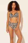 Zoe is wearing a 8 suit, she has a 34D bust and a 29” waist.