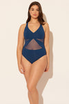 Sara is wearing a 10 suit, she has a 36D bust and a 30.5” waist.