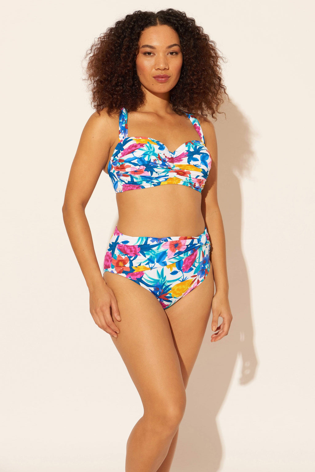 Zoe is wearing a 8 suit, she has a 34D bust and a 29” waist.