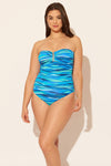 Sara is wearing a 10 suit, she has a 36D bust and a 30.5” waist.