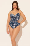 Sara is wearing a 10 suit, she has a 36D bust and a 30.5” waist.