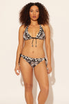 Zoe is wearing a 8 suit, she has a 34D bust and a 29” waist.