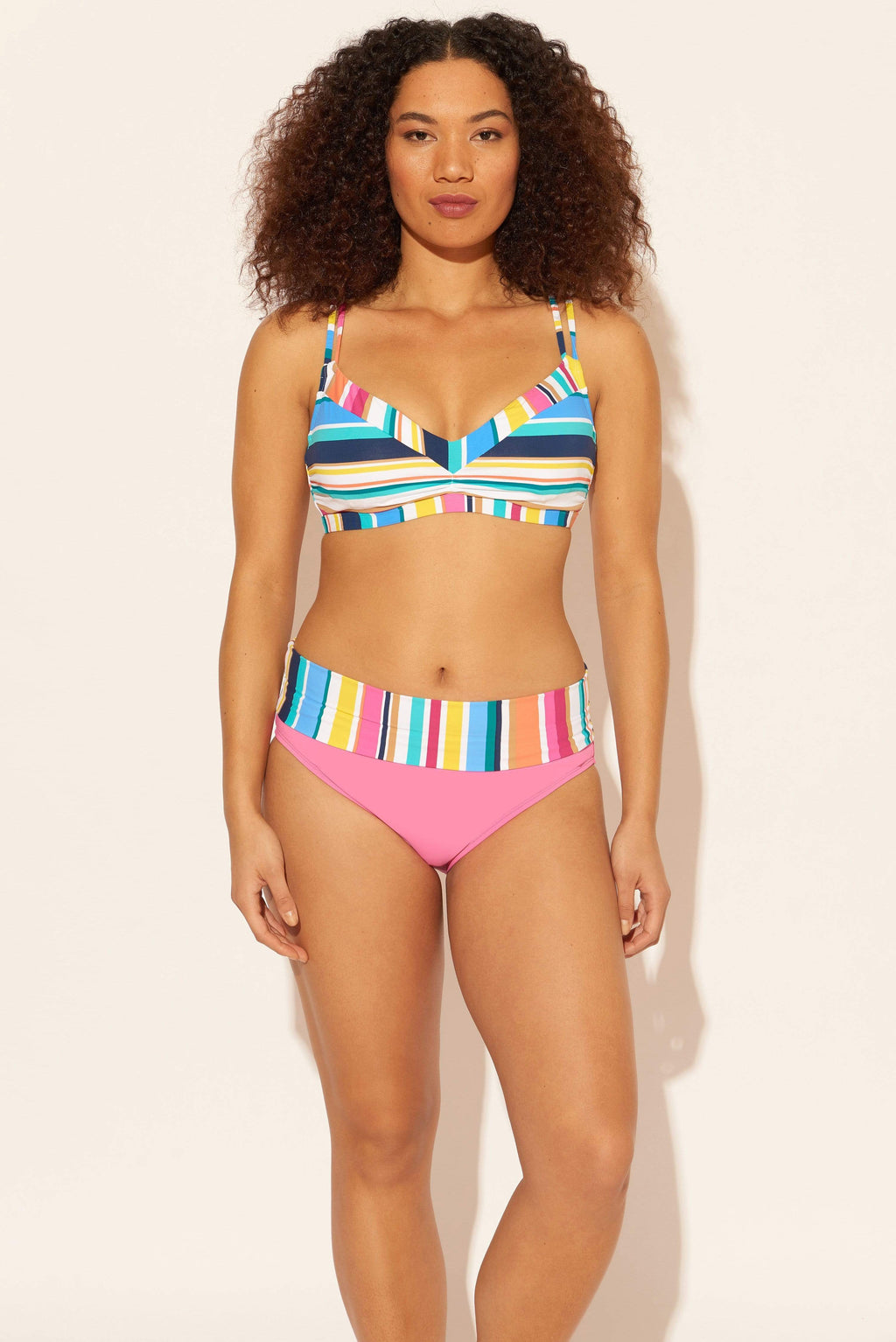 Zoe is wearing a 8 suit, she has a 34D bust and a 29” waist.