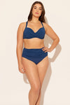 Sara is wearing a 10 suit, she has a 36D bust and a 30.5” waist.