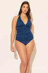 Sara is wearing a 10 suit, she has a 36D bust and a 30.5” waist.