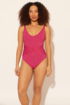 Zoe is wearing a 8 suit, she has a 34D bust and a 29” waist.