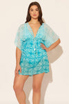 Sara is wearing a 10 suit and a M coverup, she has a 36D bust and a 30.5” waist.