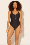 Zoe is wearing a 8 suit, she has a 34D bust and a 29” waist.