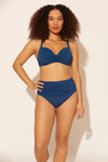Zoe is wearing a 8 suit, she has a 34D bust and a 29” waist.