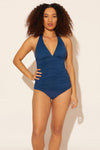 Zoe is wearing a 8 suit, she has a 34D bust and a 29” waist.