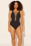Zoe is wearing a 8 suit, she has a 34D bust and a 29” waist.