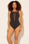 Zoe is wearing a 8 suit, she has a 34D bust and a 29” waist.