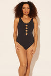 Zoe is wearing a 8 suit, she has a 34D bust and a 29” waist.