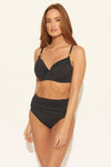 Hailey is wearing a 4 suit, she has a 32” bust and a 23" waist.
