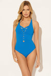 Lada is wearing a 6 suit, she has a 34” bust and a 24" waist.