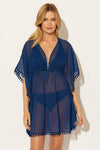 Lada is wearing a 6 suit and S coverup, she has a 34” bust and a 24" waist.