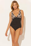 Lada is wearing a 6 suit, she has a 34” bust and a 24" waist.