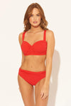Hailey is wearing a 4 suit, she has a 32” bust and a 23" waist.