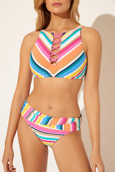 Lada is wearing a 6 suit, she has a 34” bust and a 24" waist.