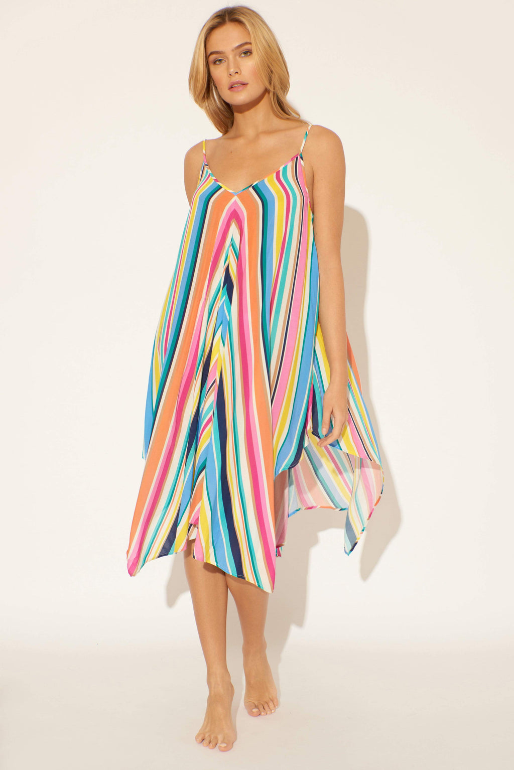 Lada is wearing a 6 suit and S coverup, she has a 34” bust and a 24