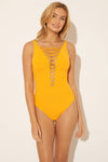 Lada is wearing a 6 suit, she has a 34” bust and a 24" waist.