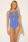 Lada is wearing a 6 suit, she has a 34” bust and a 24" waist.