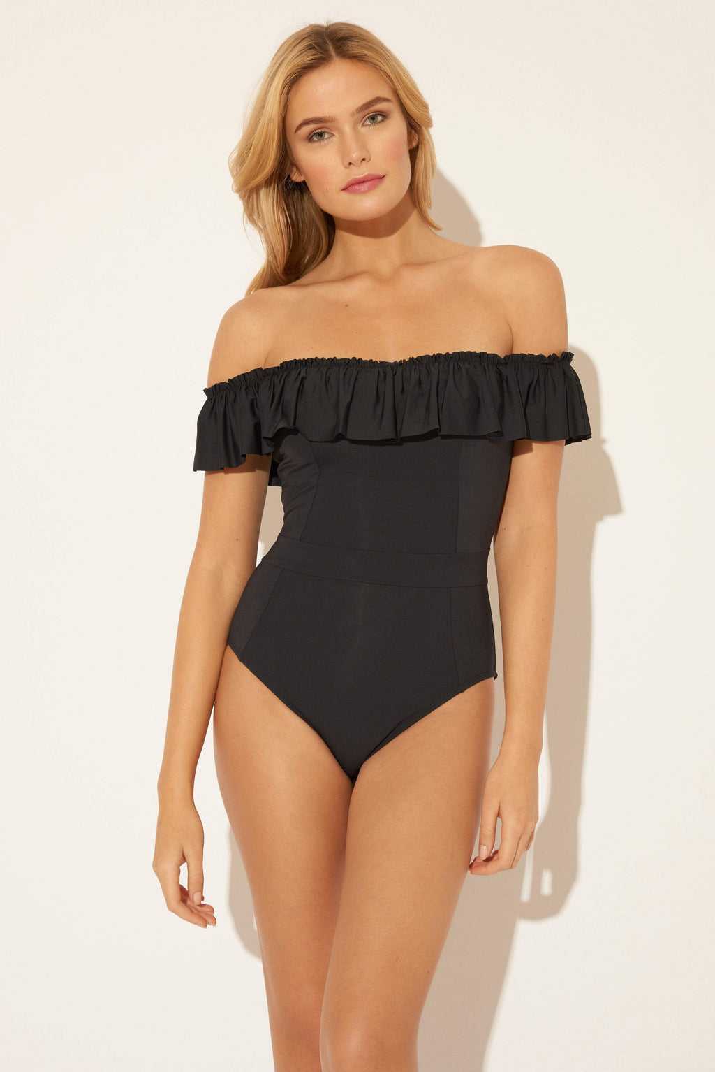 Lada is wearing a 6 suit, she has a 34” bust and a 24